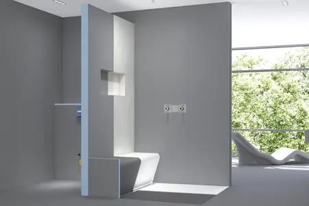 Klar strukturierter WC-Bereich mit wandbündiger Sitzlösung – auf Basis des wedi Bausystems.