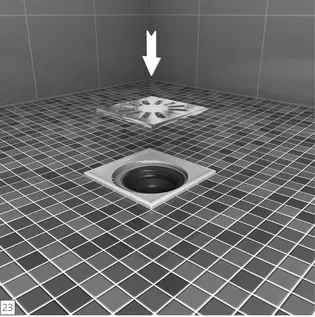 23. Ablaufabdeckung einsetzen Einsetzen der Ablaufabdeckung in die Punktentwässerung der gefliesten bodengleichen Dusche.