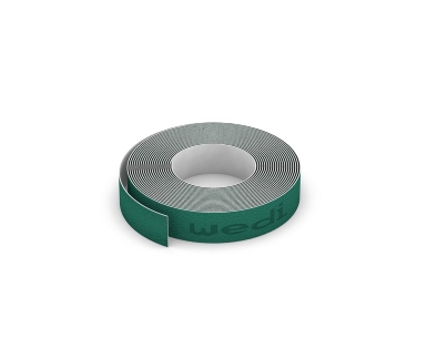 Self-adhesive Wedi Tools cut protection tape to protect wall and floor sealing